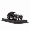 * Ralph Lauren 1938 Bugatti Type 57Sc Atlantic Coupe Sculpture | Toasting Flutes